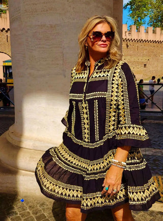 Gold thread embroidered detail on black cotton mini dress for tall women