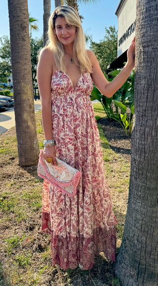 Tall woman twirling in Bordeaux paisley halter dress with crystals, 62-inch length designed for women 5’11” to 6’6