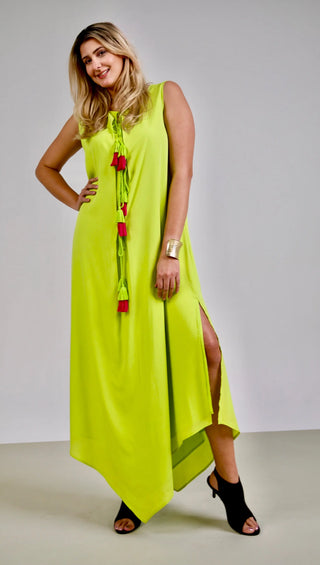 Jezebel Maxi Dress, an on-trend cocktail dress that’s designed to make a bold statement. With its vibrant lime green color and stylish details, this dress is perfect for tall women who love to stand out.  Chic and Edgy Design:  Flirty and Flowy Hem: The flirty and flowy hem adds a playful touch, ensuring you turn heads wherever you go. Edgy Slit: The edgy slit adds a daring element, perfect for showing off your legs and adding movement to your stride. Vibrant Lime Green: The punchy lime green color is bold 