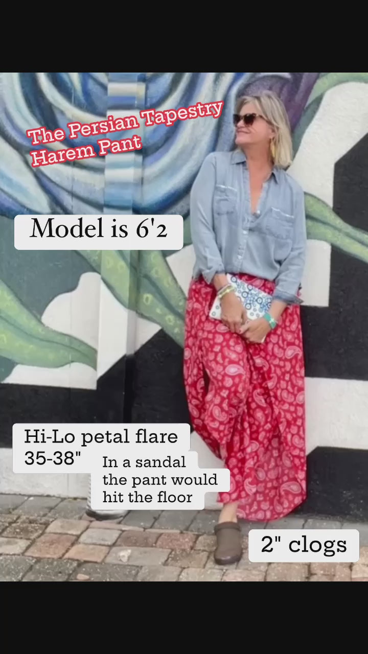 The Persian Tapestry Harem Pant is more than just a pair of pants; it's a statement piece that combines exotic charm with modern elegance for tall women with long inseams. Elevate your style effortlessly with this unique and versatile addition to your wardrobe. Thank you for your support and trust; we know you'll love this meticulously curated piece.  Size Options:  Small Medium Large