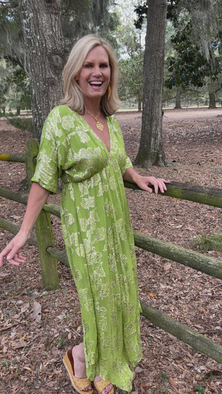 Maya Dress, the perfect blend of flowy and flattering design, tailored specifically for tall women. This dress, in a light olive green color with delicate gold woven appliques, is a color-forward fashion choice that brings a touch of glamour to any occasion. Whether it's a daily outing or a special trip, the Maya Dress will boost your mood and turn heads wherever you go.  Chic and Flattering Design:  Light Olive Green with Gold Appliques: The subtle yet sophisticated light olive green color.