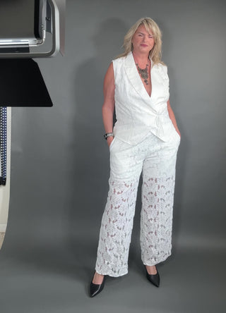 Watch the Paloma Set in motion — see how the longline vest and curve-friendly pants move with you. Tall fit. Luxe flow. Limited run.

